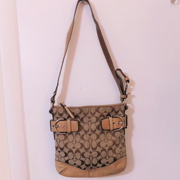 Coach Handbags - Coach Signature Canvas Soho Duffle E065-3574